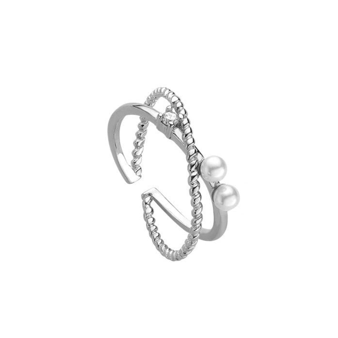 Anillo cruzado con perla