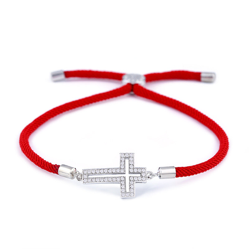 Cross bracelet with cubic zirconia.