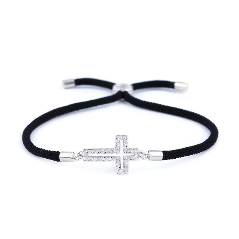 Cross bracelet with cubic zirconia.