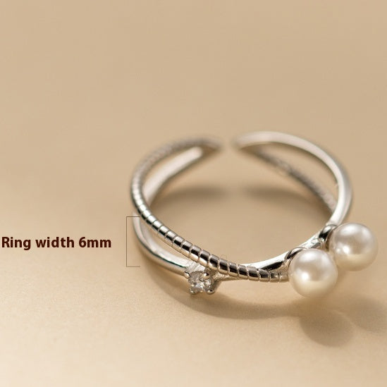 Anillo cruzado con perla