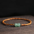 Bamboo bracelet with green jade.