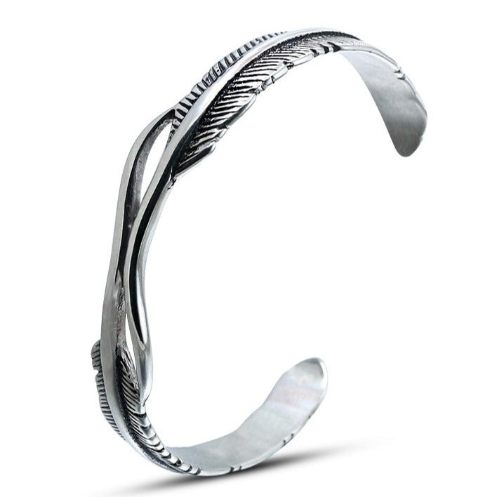 Pulsera de plumas en acero de titanio