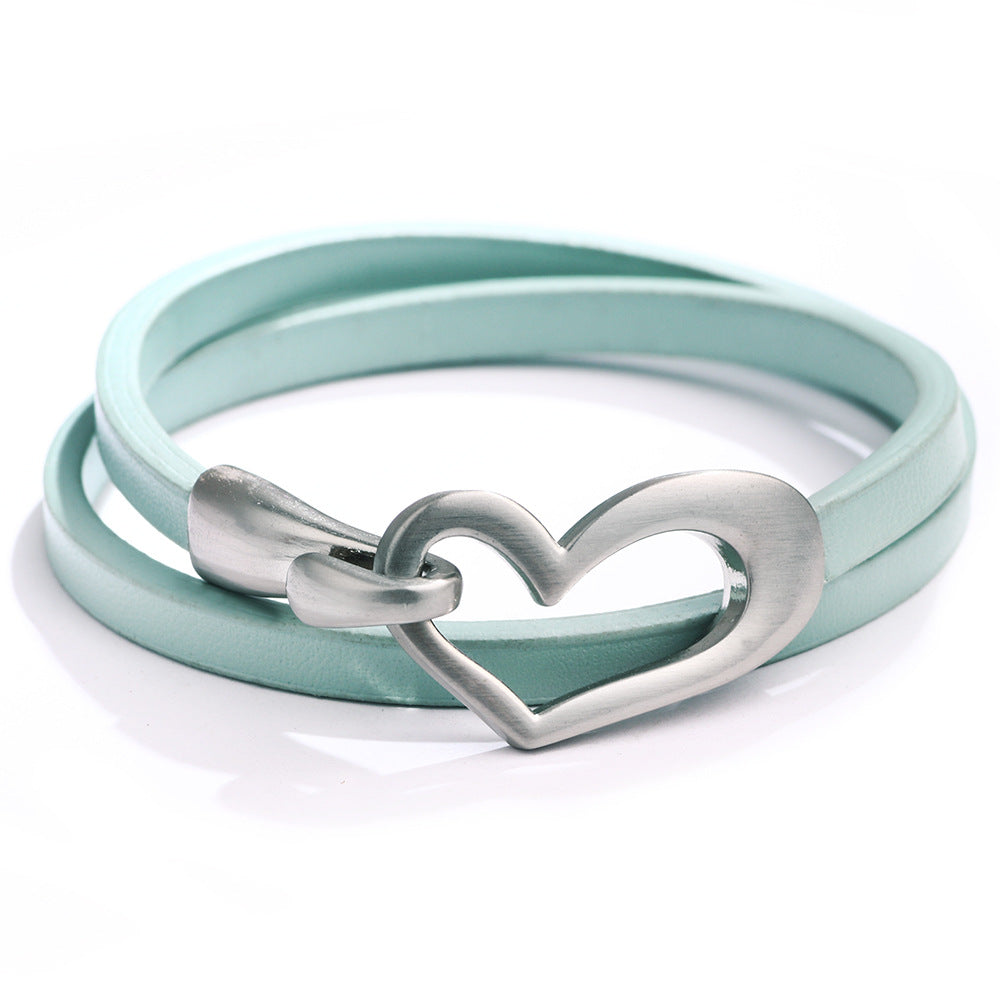 Bracelet or choker with heart motif.