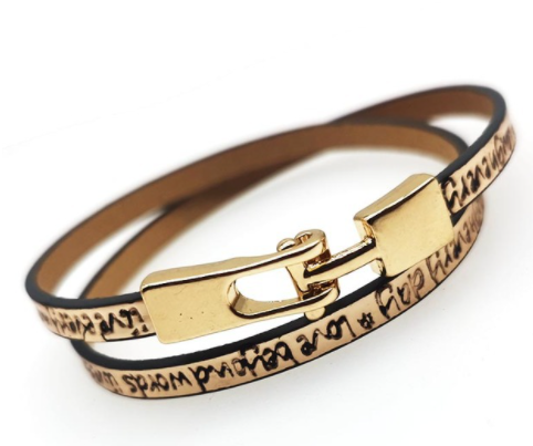 Bracelet or choker with heart motif.