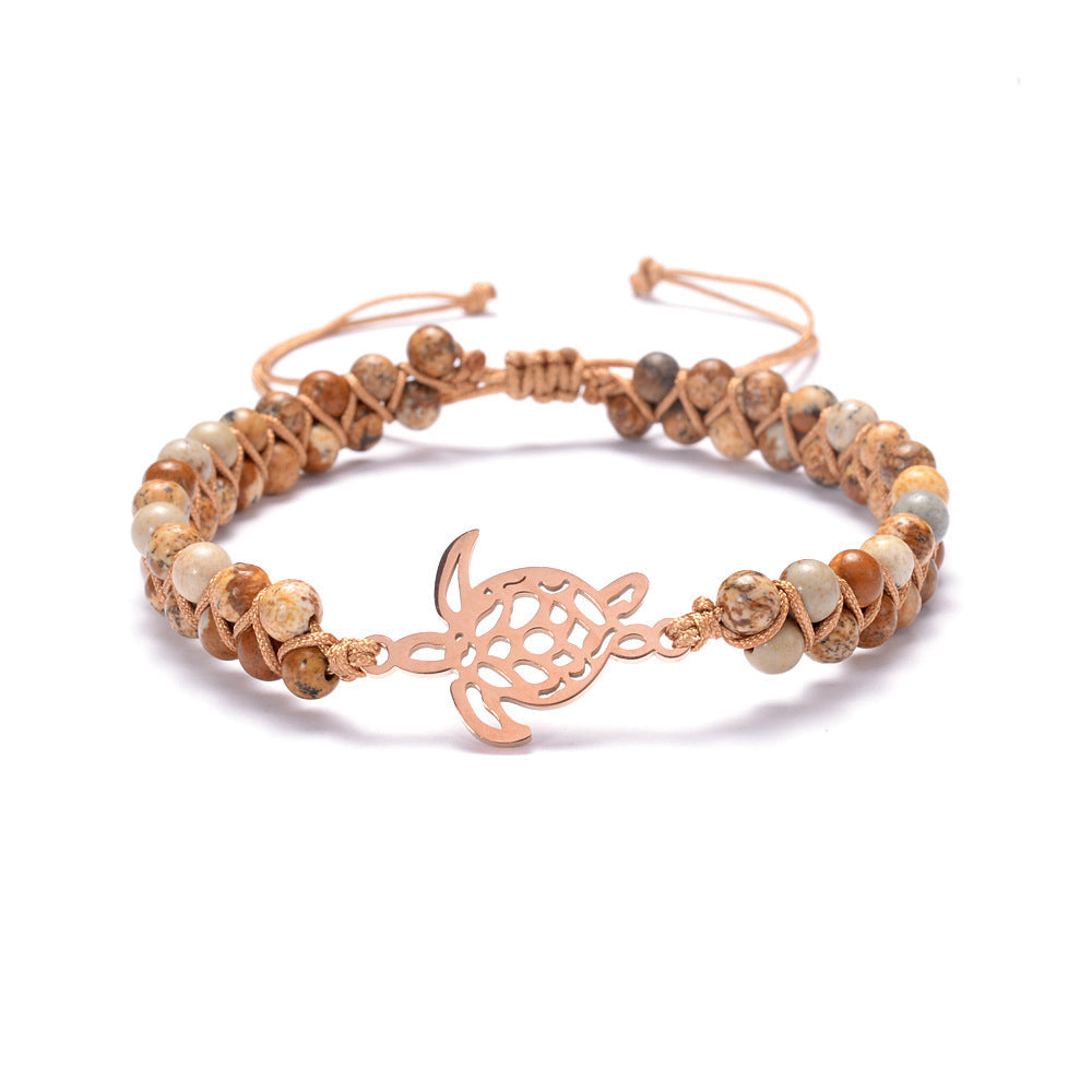 Turtle bracelet in natural stone and stainless steel.