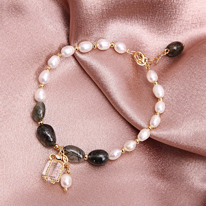 Pulsera de perlas y cristales naturales