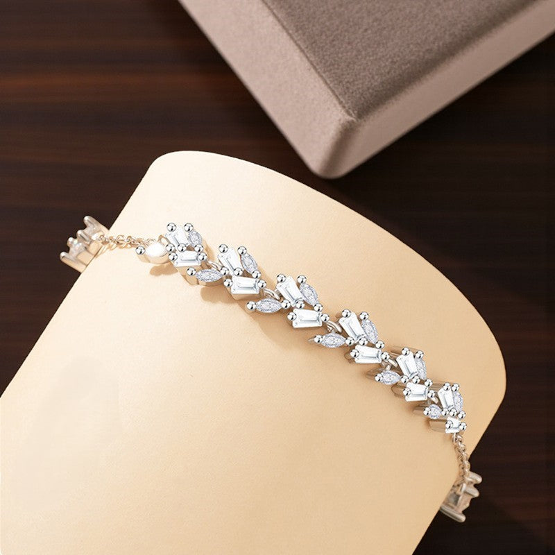 Leaf bracelet with cubic zirconia.