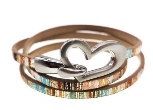 Bracelet or choker with heart motif.