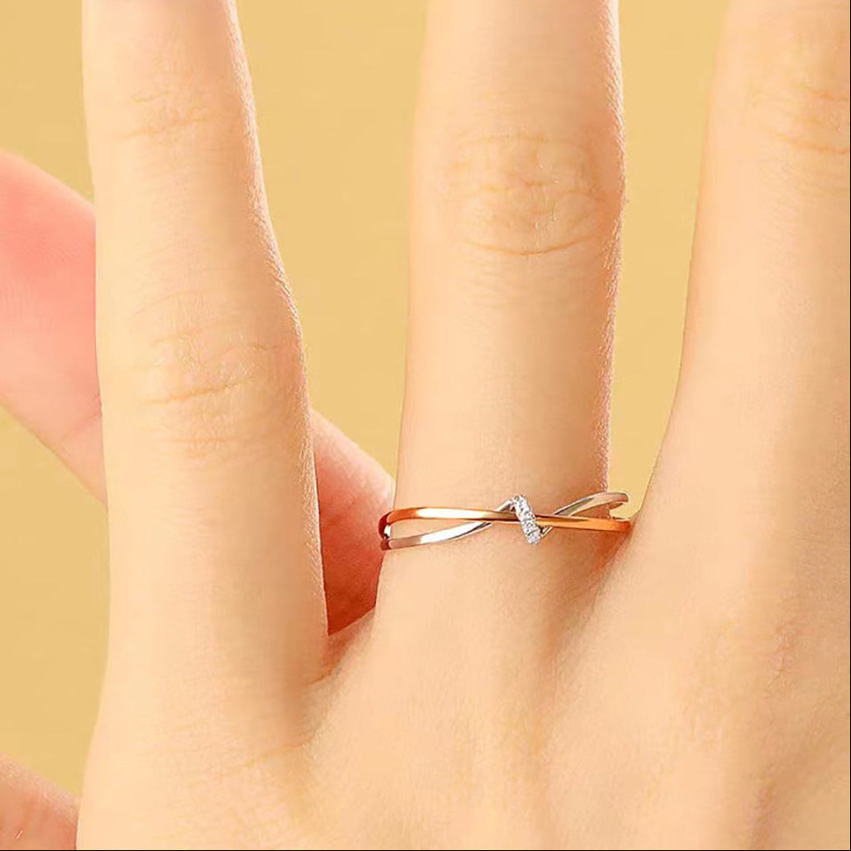 Anillo bicolor entrelazado