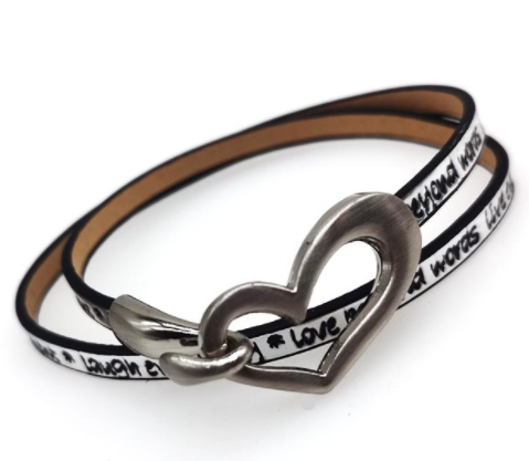 Bracelet or choker with heart motif.