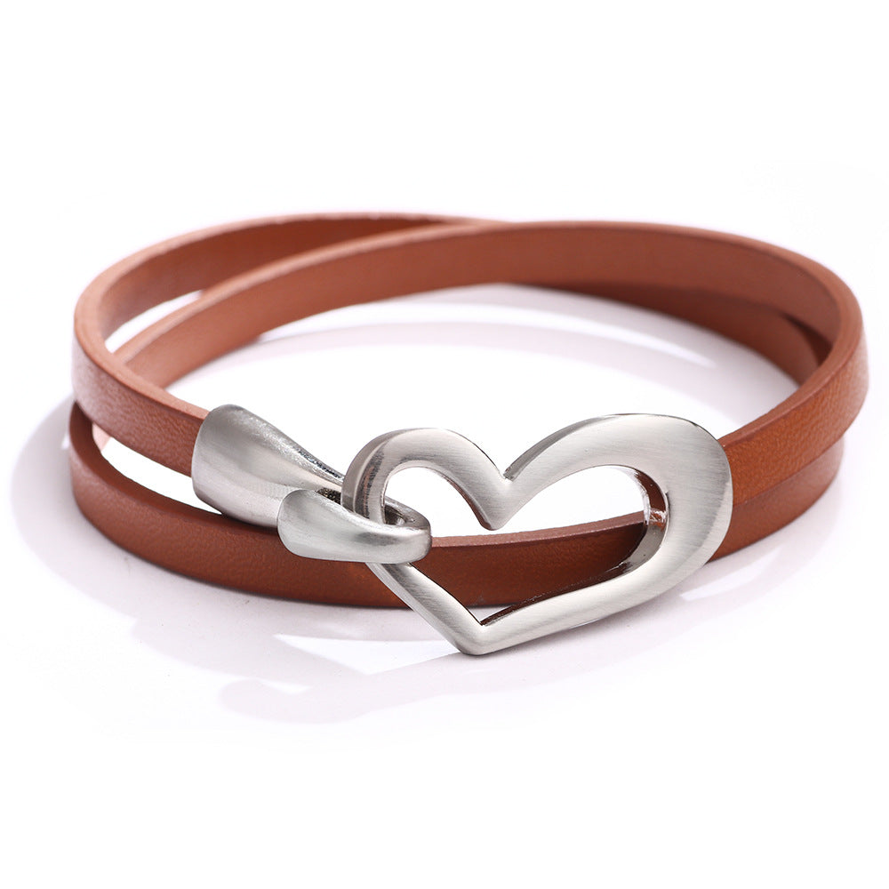Bracelet or choker with heart motif.