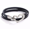 Bracelet or choker with heart motif.