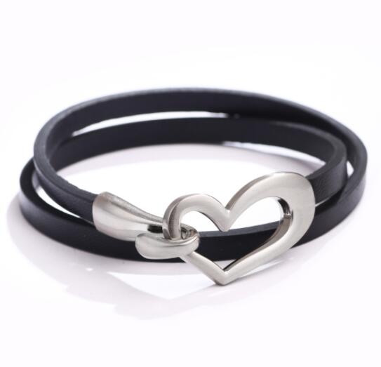 Bracelet or choker with heart motif.