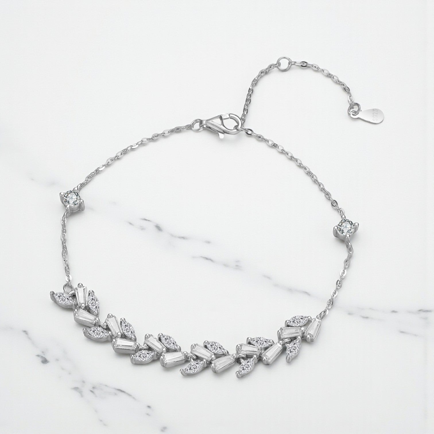 Leaf bracelet with cubic zirconia.